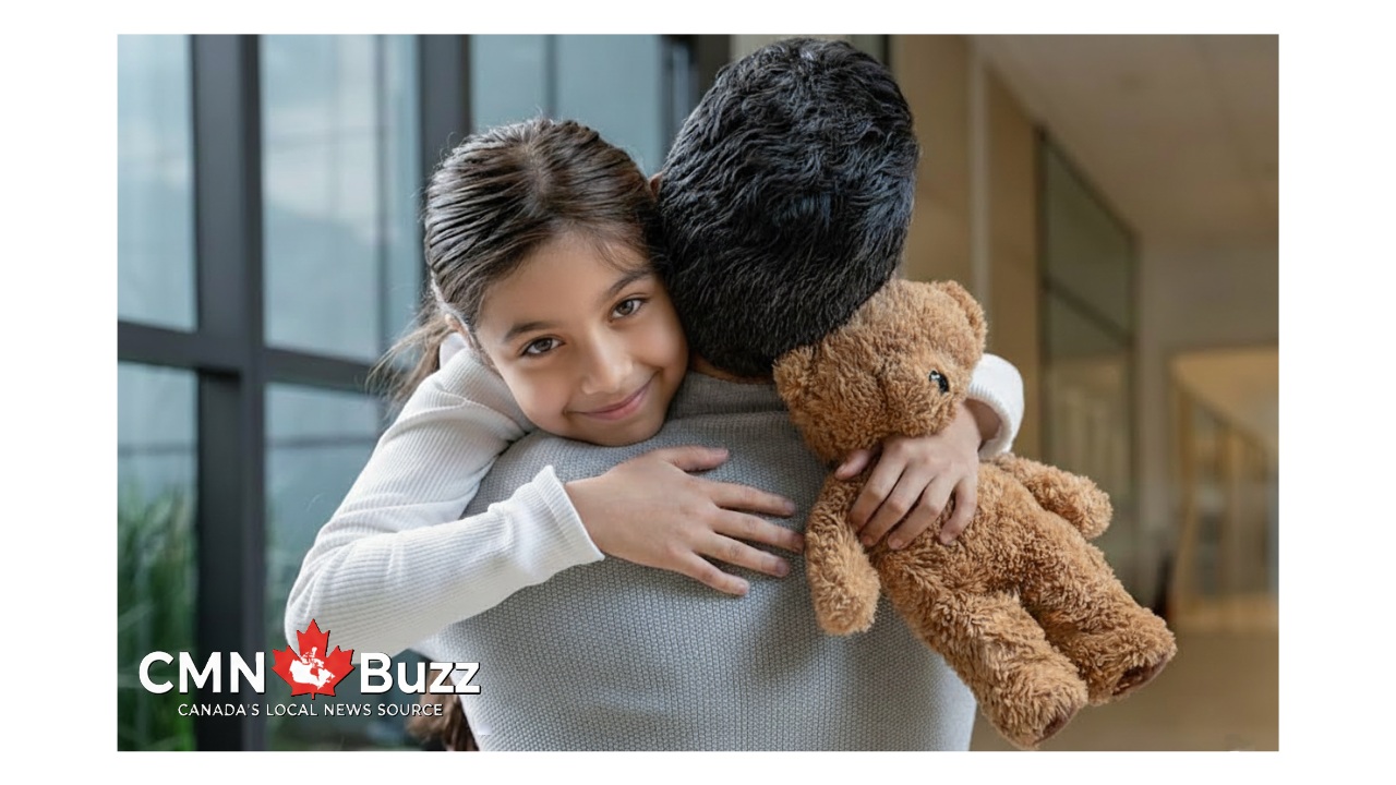 An Indian father hugging his young daughter while holding a teddy bear, representing the emotional journey of Malayali families migrating from Canada.