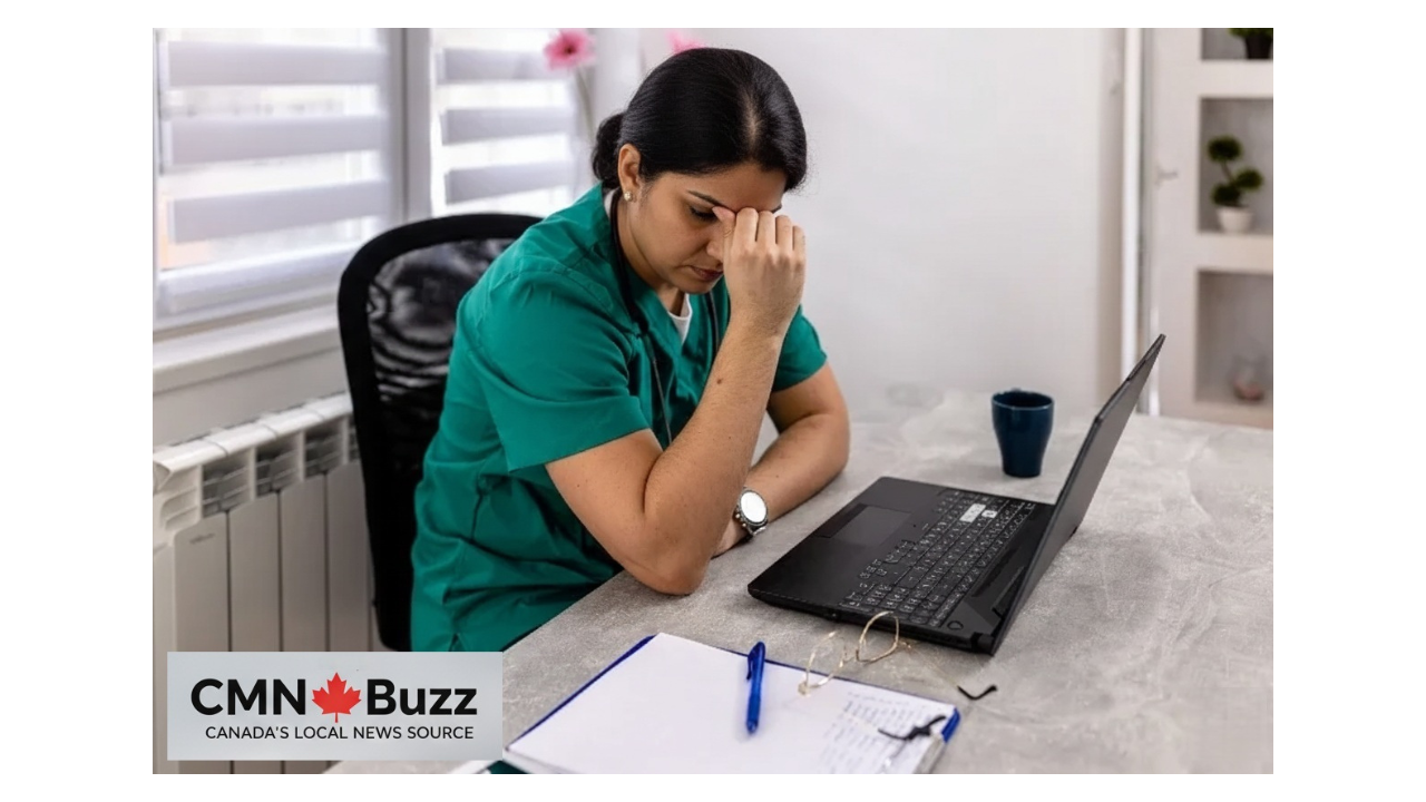 Frustrated Indian nurse in green scrubs sitting with laptop contemplating Canada nursing license delays and career struggles.